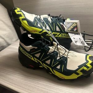 Salomon Black and Yellow Athletic Shoes for Trail Performance